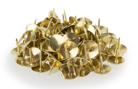 Construction nails gold on a white background