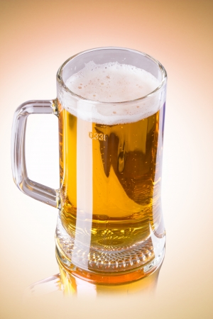 Mug fresh beer isolated on white .の写真素材