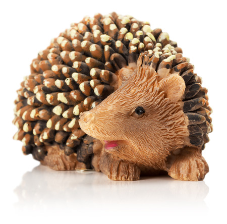 hedgehog figurine isolated on the white background.の写真素材