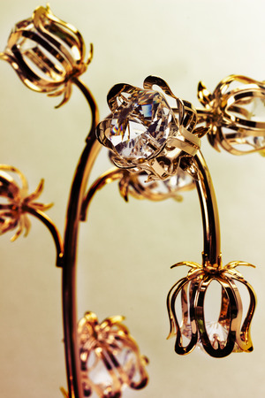 golden decorative flowers isolated on the white background.の写真素材