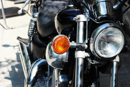 close up photo of retro black motobike.の写真素材
