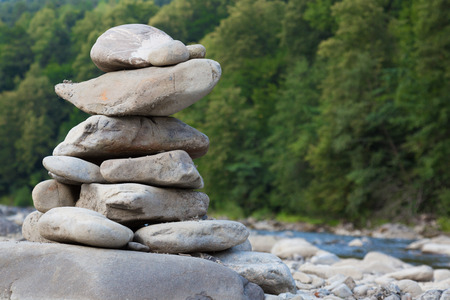 stacked stones on the river coast.の写真素材