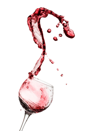 Red wine splash isolated on the white background.の写真素材