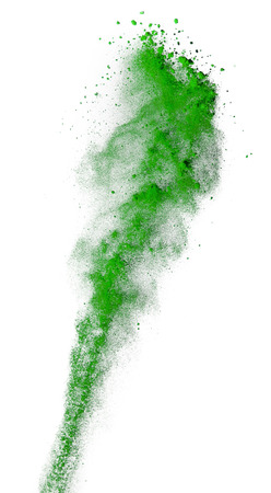 Green powder explosion isolated on white background.の写真素材