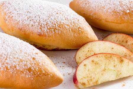 close up of patties with apples.