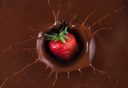 strawberry in chocolate splash.の写真素材