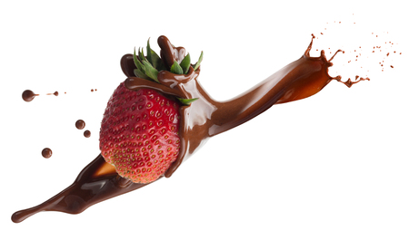 strawberry in chocolate splash isolated on a white background.の写真素材