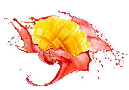 mango in red juice splash isolated on a white background.の写真素材