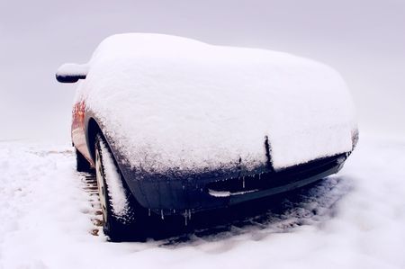 Car in snow in winter の写真素材