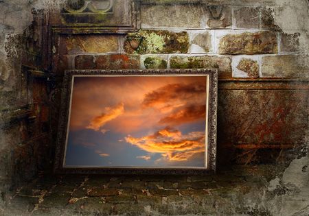 Sky picture in classic frame on grunge backgroundの写真素材