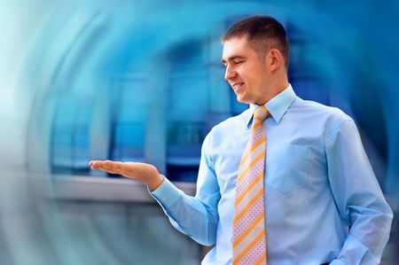 Happiness businessman on blur business architecture backgroundの写真素材