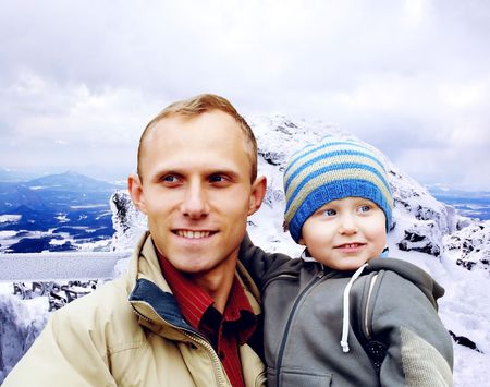 Happy family portrait outdoors smiling. Winterの写真素材