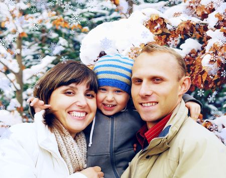 Happy family portrait outdoors smiling. Winterの写真素材