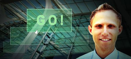 Happiness businessman in the business studio with monitorsの写真素材