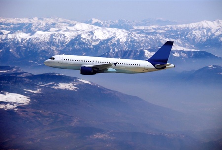 Airplane on the blue skyの写真素材