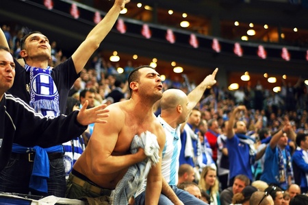 PRAGUE, CZECH REPUBLIC - APRIL 5: Iraklis team supporters watch the volleyball game of Final Four CEV Indesit Champions League at O2 Arena in Prague. April 5, 2009のeditorial素材