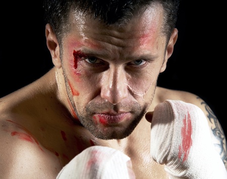 Aggressive boxer with blood on the faceの写真素材