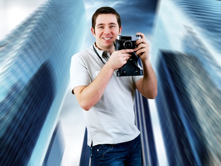 Happiness man with vintage photo camera