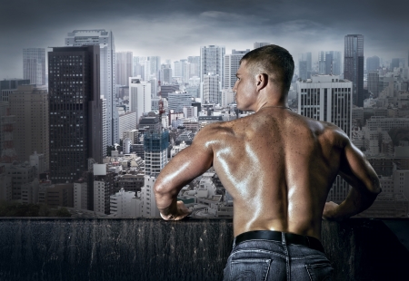 Man stay on the roof of skyscraperの写真素材