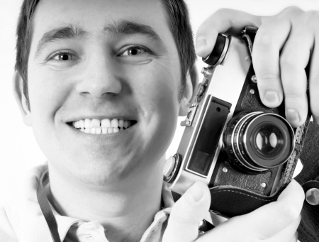 Happiness man with vintage camera.の写真素材