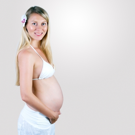 Happiness pregnant women in the whiteの写真素材
