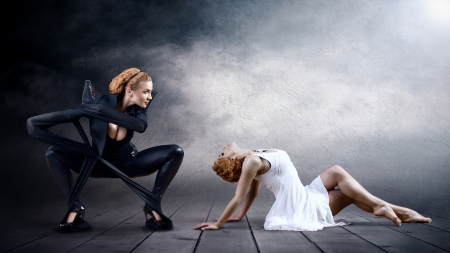 Black and White Dancers in posing on backgroundの写真素材