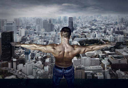 Man stay on the roof of skyscraperの写真素材