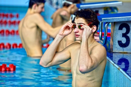 Swimmer in waterpool swim one of swimming style