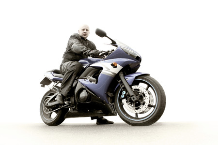 Man sitting on the motorcycle の写真素材