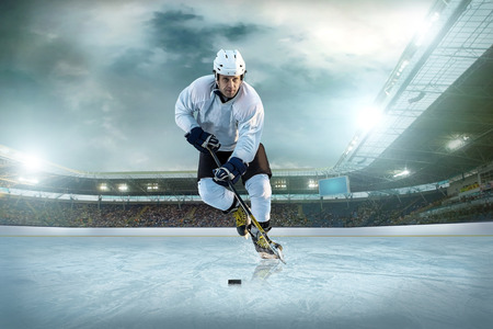 Ice hockey player on the ice. Open stadium - Winter Classic game.の写真素材