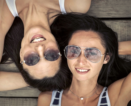 Portrait of couple on the wooden background.の写真素材