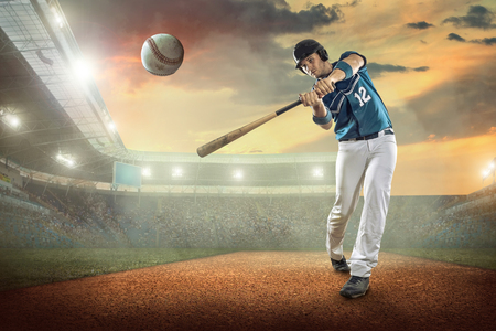 Baseball players in action on the stadium.の写真素材