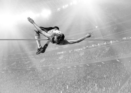 Athlete in action of high jump.の写真素材