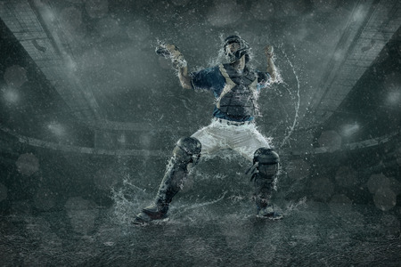 Baseball players in action under waterの写真素材
