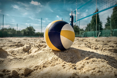 Beach Volleyball. Game ball under sunlight and blue sky.の写真素材
