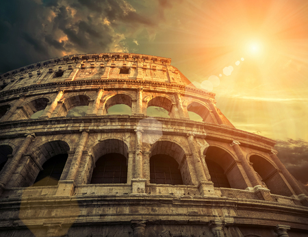 Rome, Italy.One of the most popular travel  place in world - Roman Coliseum under evening sun light and sunrise sky.の写真素材