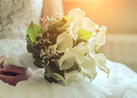 Wedding white flowers on the white dress.の写真素材