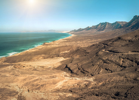 Beautiful valley panoramic view on the ocean coastline near mountains at sunny day. Travell,...
