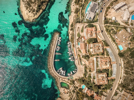 Beautiful birdeye view on the sea coastline with pier and yakhts at sunny day. Travell, jorney,islands, Seascape, freedom, holidays concept.の写真素材