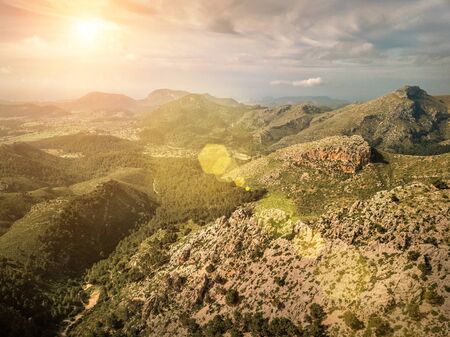 Beautiful birdeye view on forest in mountains at sunny day. Palme de Mallorca island. Travell,...