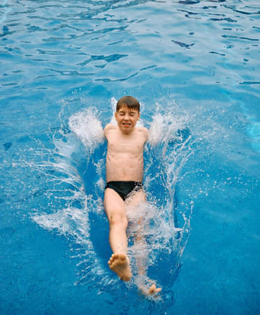 Child jump, swim in the pool, sunbathes, swimming in hot summer day. Relax, Travel, Holidays,...