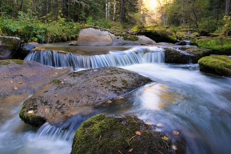 A small waterfall on the river Belokurikha.の写真素材