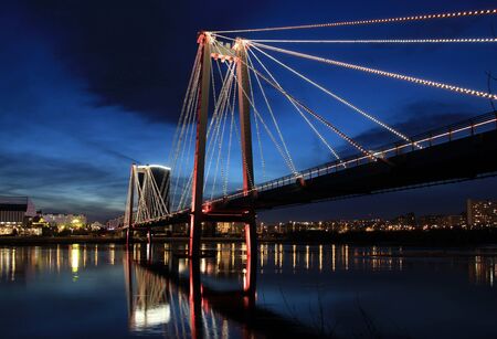 Night Krasnoyarsk. Vinogradovsky bridge over the Yenisei.の写真素材