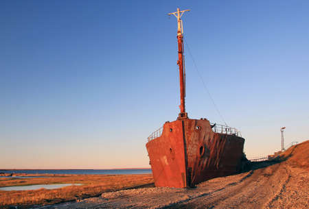 Old rusty ship. Northern river Khatanga. Siberia. Krasnoyarsk region.の写真素材