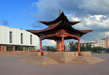 Kyzyl, Tuva (Tyva, Tyva Republic), Russia. 06.20.2021. National Music and Drama Theater of the Tyva Republic. Buddhist prayer wheel on Arat square.のeditorial素材
