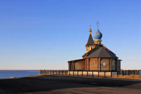 Holy Epiphany Church in the village of Khatanga in the north of the Krasnoyarsk Territory. Russiaの写真素材