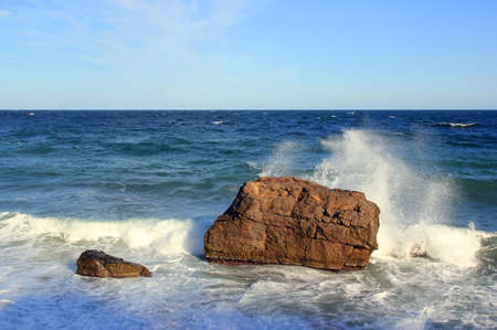 Seascape with lonely rocks and waves crashing on them. Black Sea. Crimeaの写真素材