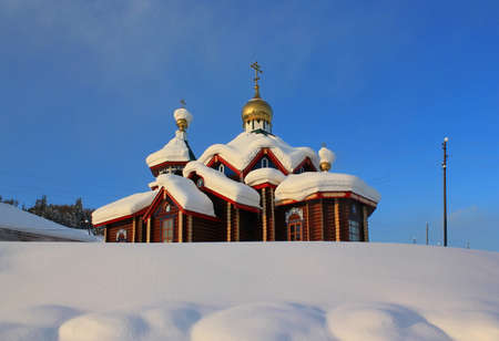 Orthodox St.Tikhon Church in the village of Baikit in the Evenki district of the Krasnoyarsk Territory. Russianの写真素材