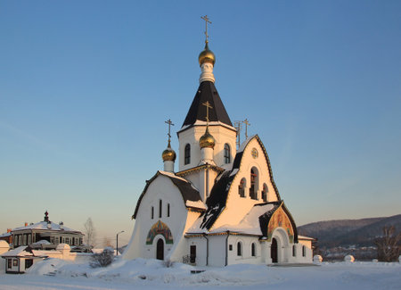 The Holy Assumption Monastery in Krasnoyarsk. Temple of the Icon of the Mother of God "The Tsaritsa" in the rays of sunset. Russiaの写真素材