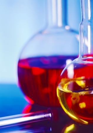 Chemistry equipment filled with different color chemicalsの写真素材